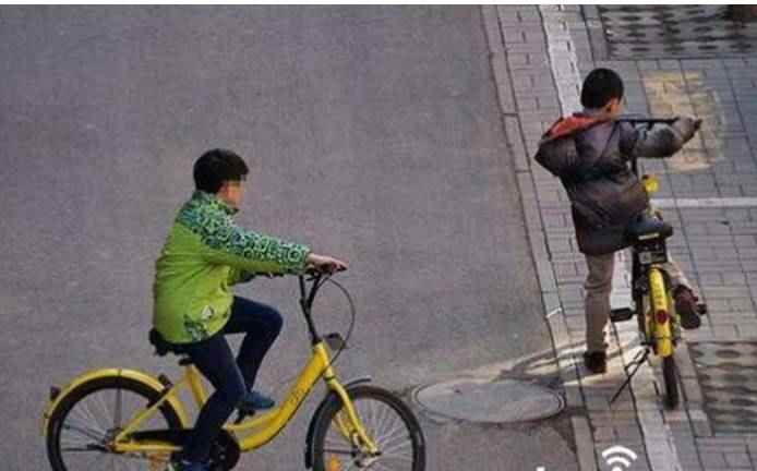新闻图片:骑共享单车的儿童 新闻图片:骑共享单车的儿童